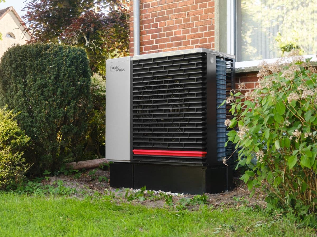 Illustrative photo of an outdoor residential heat pump